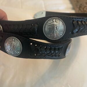 Stylish Black Leather Belt with Intricate Silver Buckle